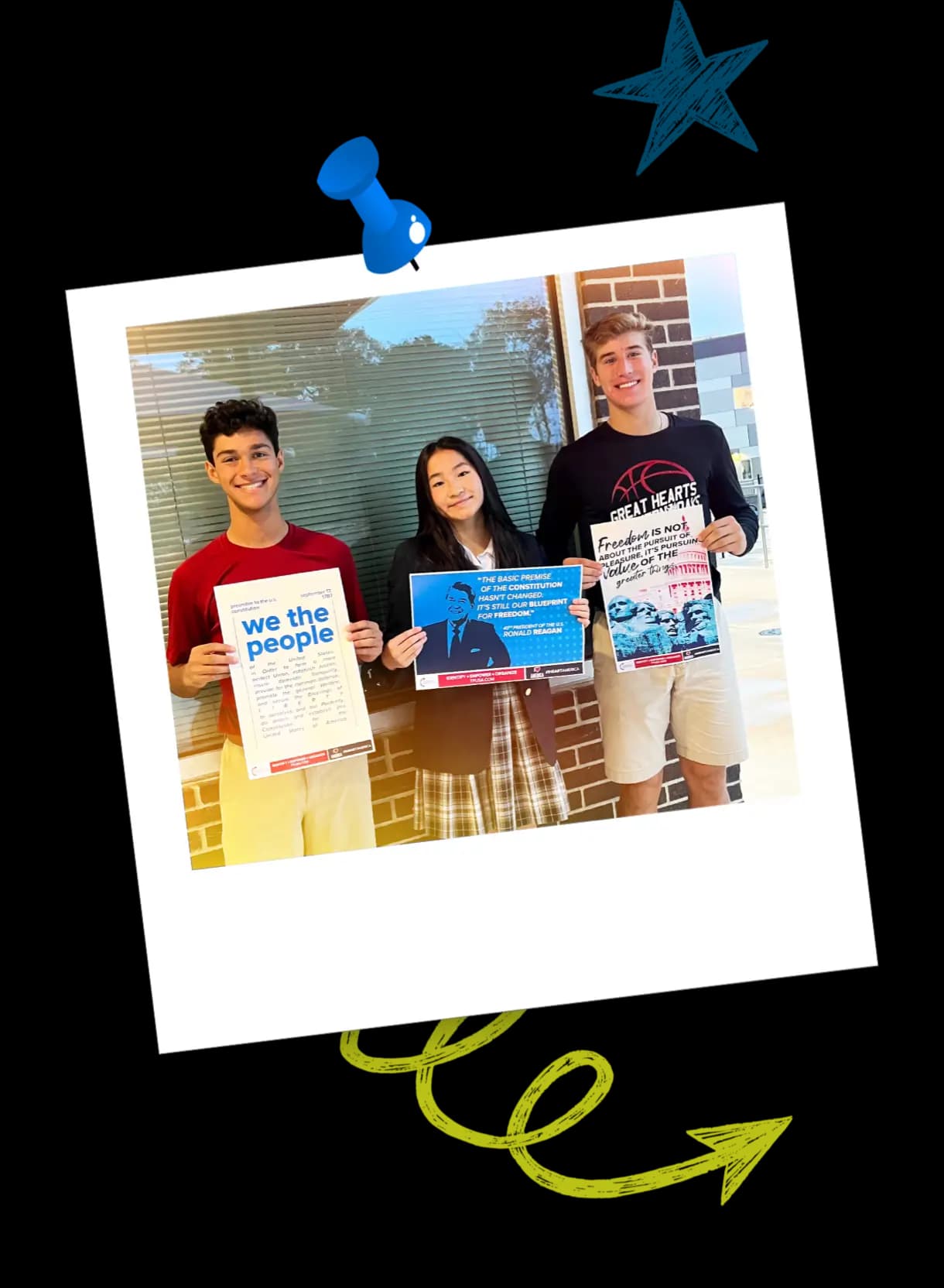 Photograph of students holding Turning Point USA signs